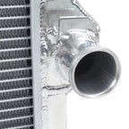 Close-up of a metallic radiator with a white background