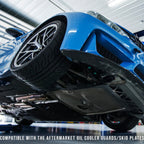 BMW Blue car elevated on a lift in a garage