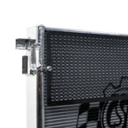 Close-up of a BMW M4 front mount heat exchanger with a brand logo on a white background