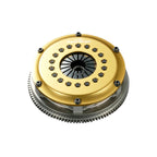 OS Giken Toyota Clutch plate with gold and silver components on a white background