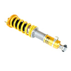 Yellow shock absorber on a white background