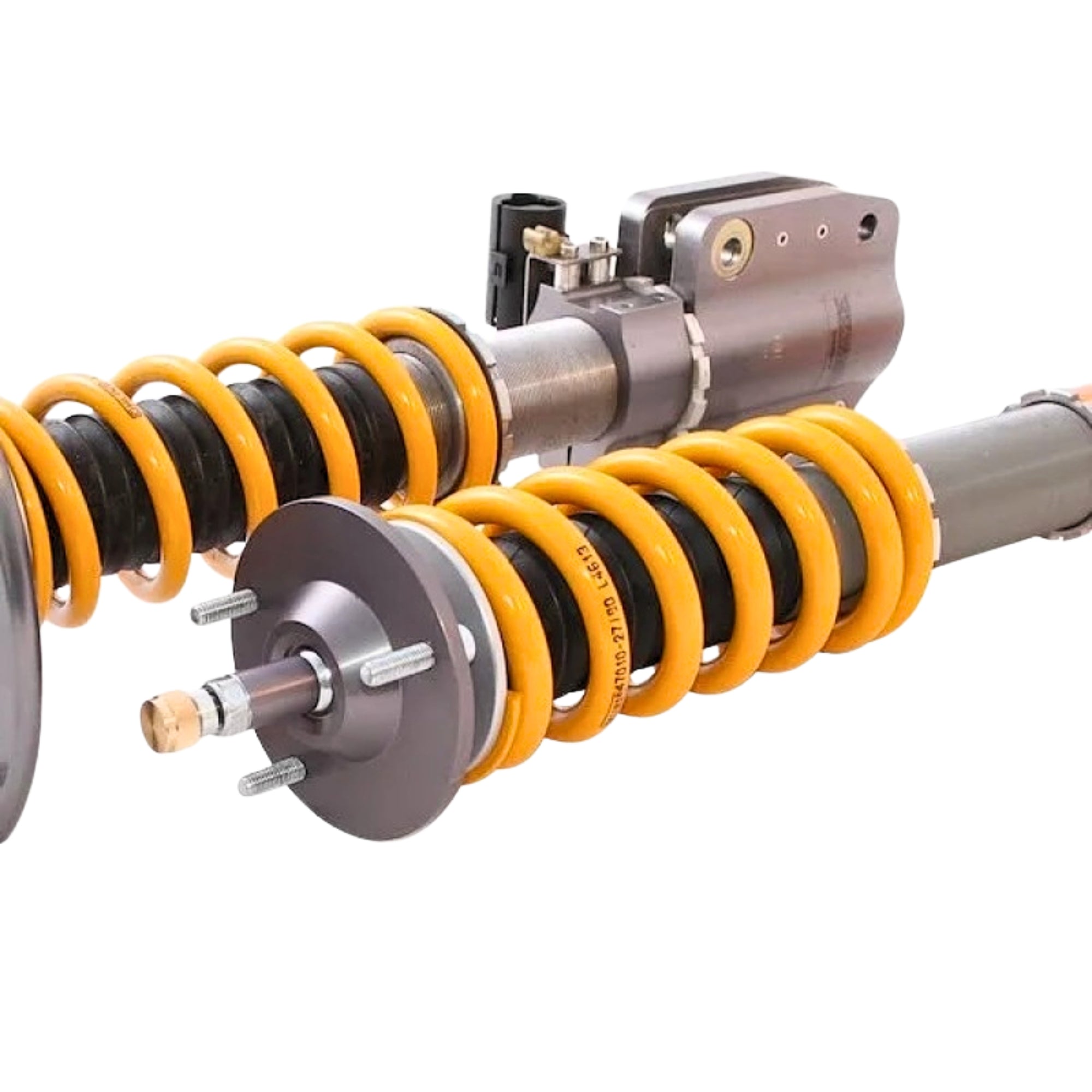 Close-up of a suspension shock absorber with yellow springs on a white background