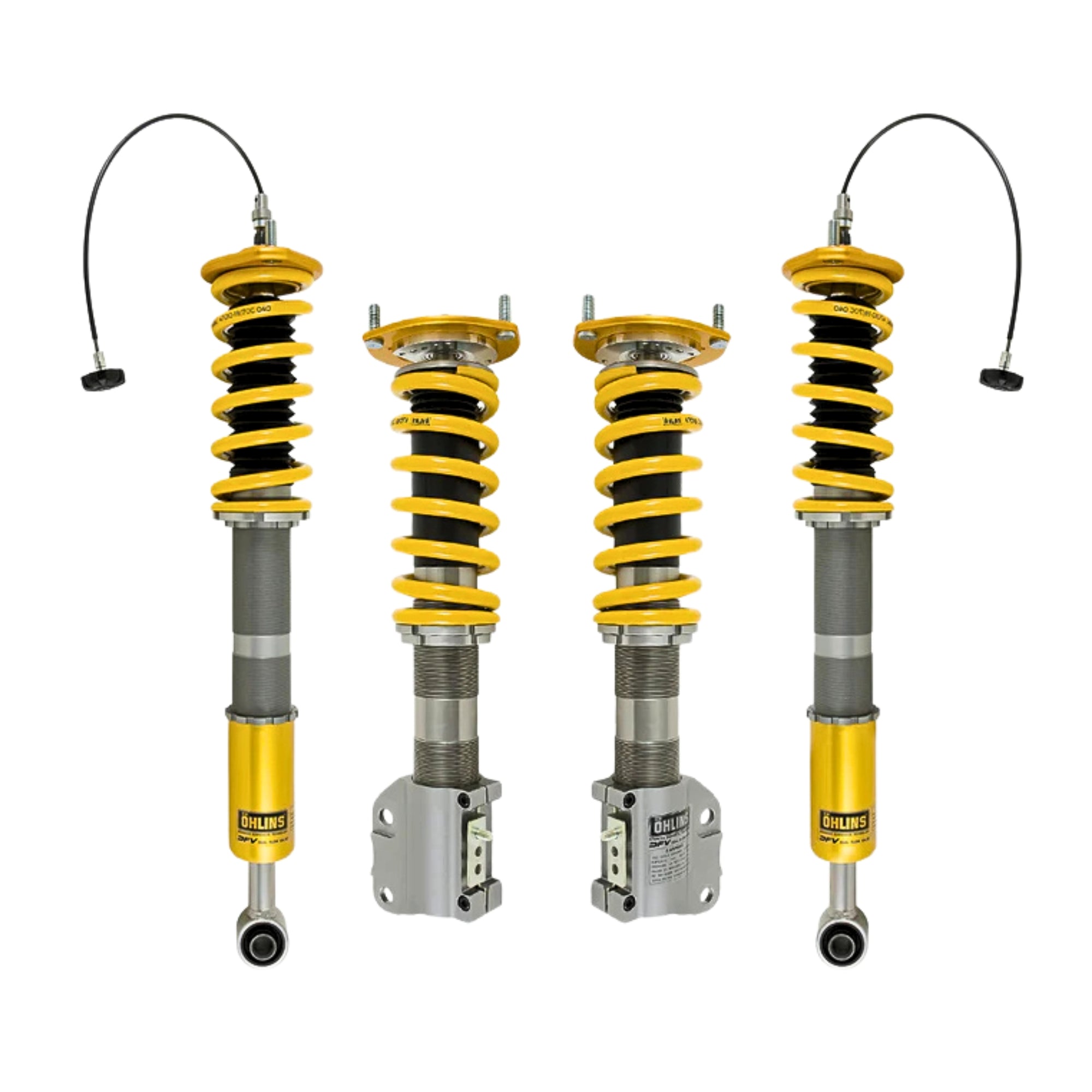 Four Ohlins shock absorber coilovers with yellow springs on a white background
