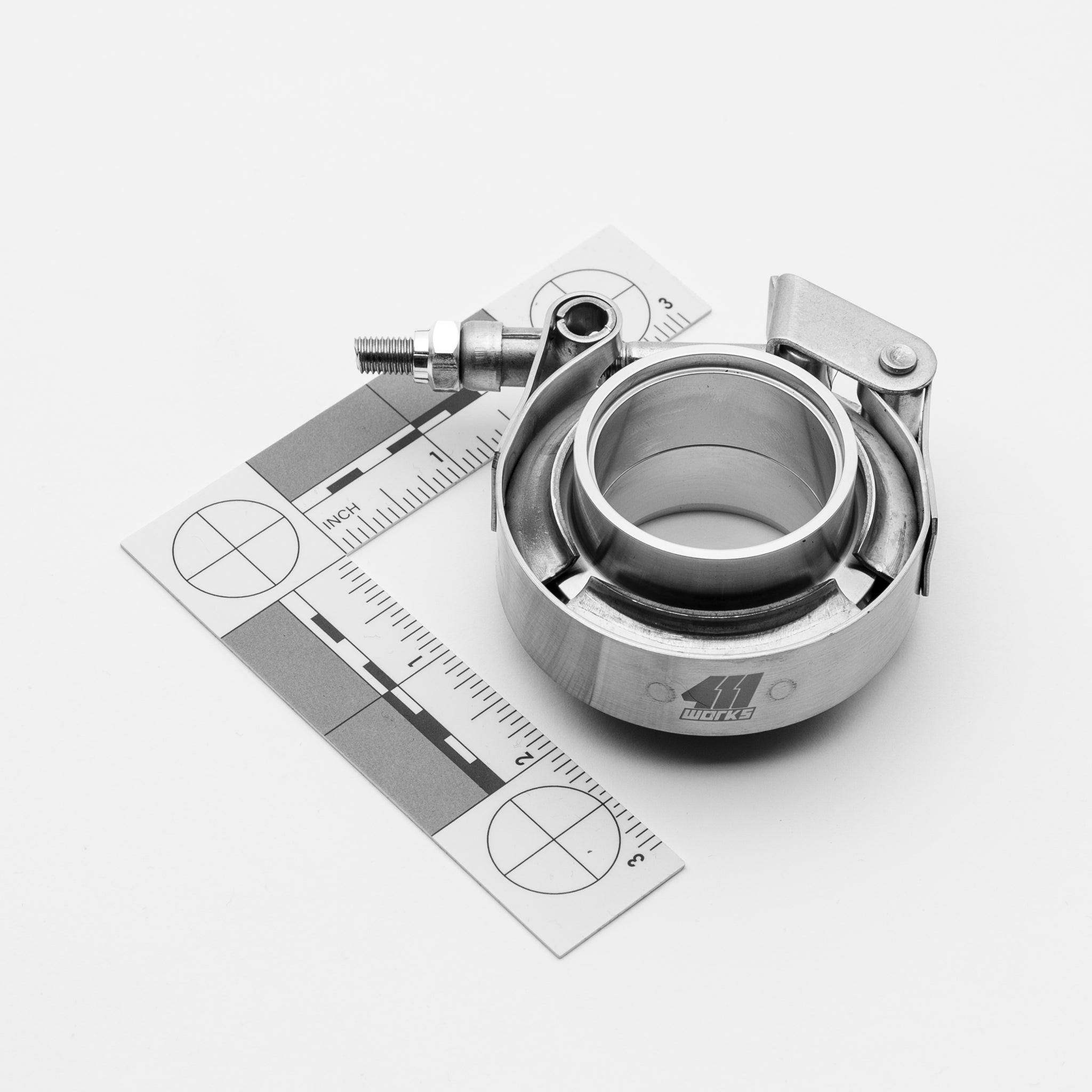 Metal pipe clamp with measurement scale on a white background