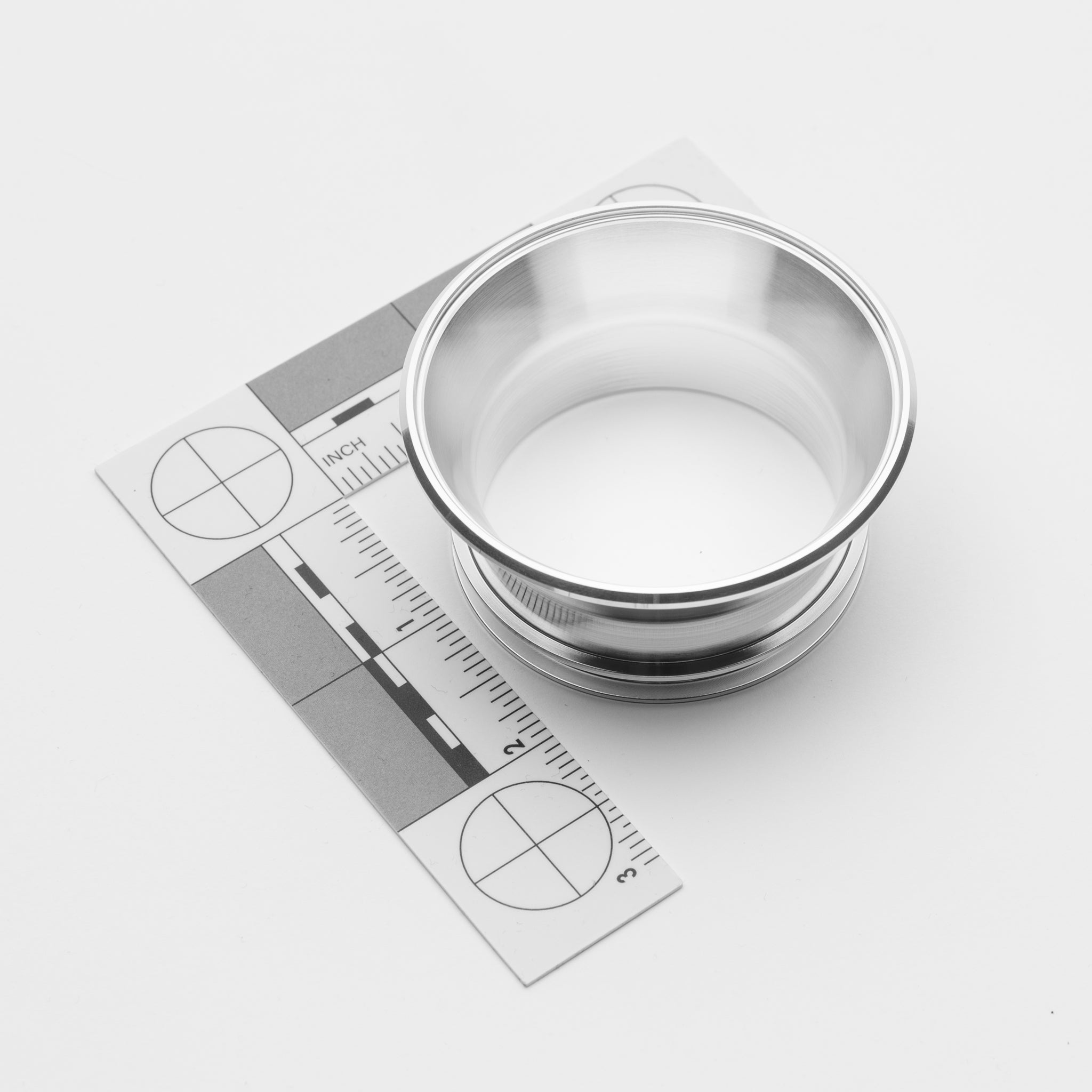 Stainless steel transitions with a ruler on a white background