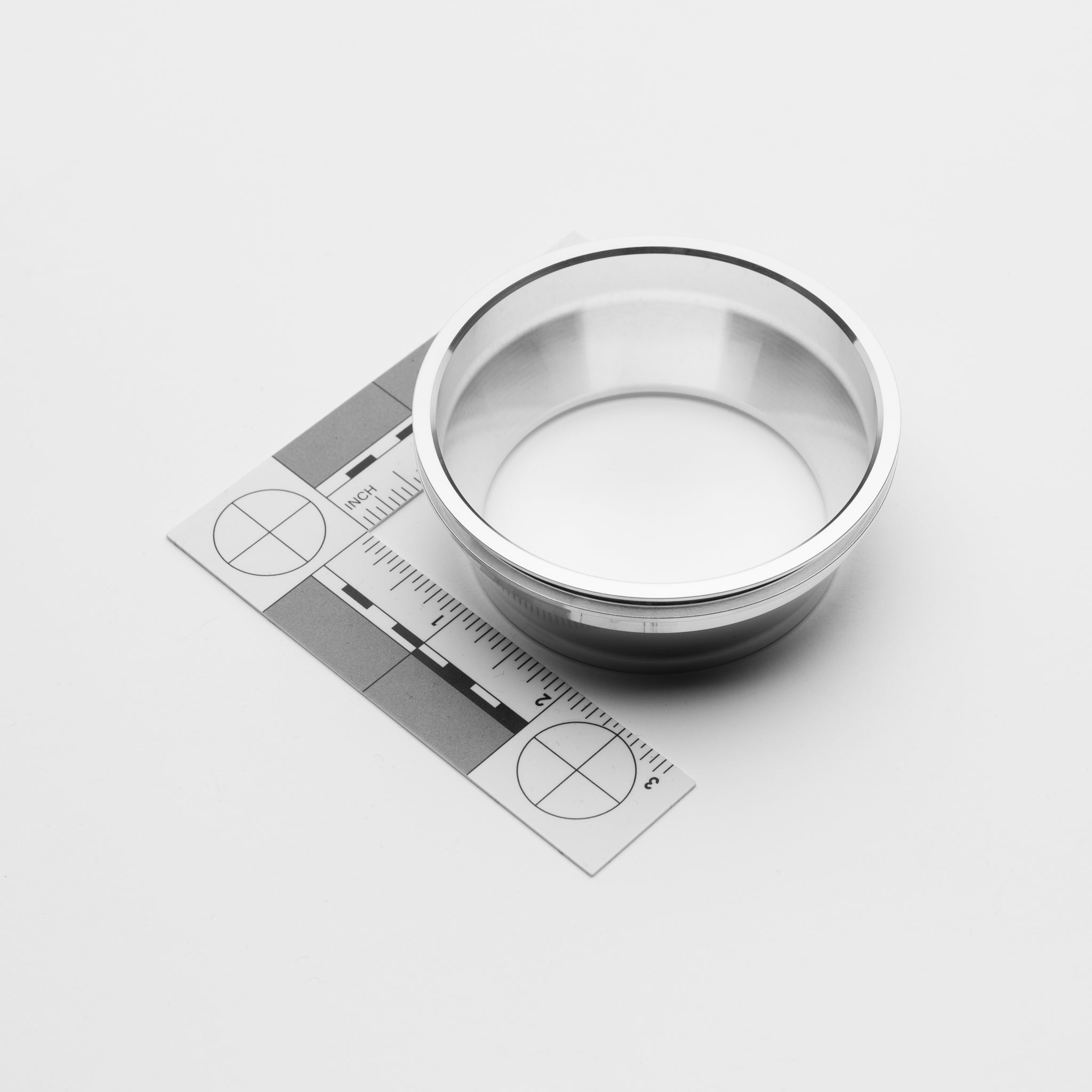 Stainless transition on a white background with measurement scale