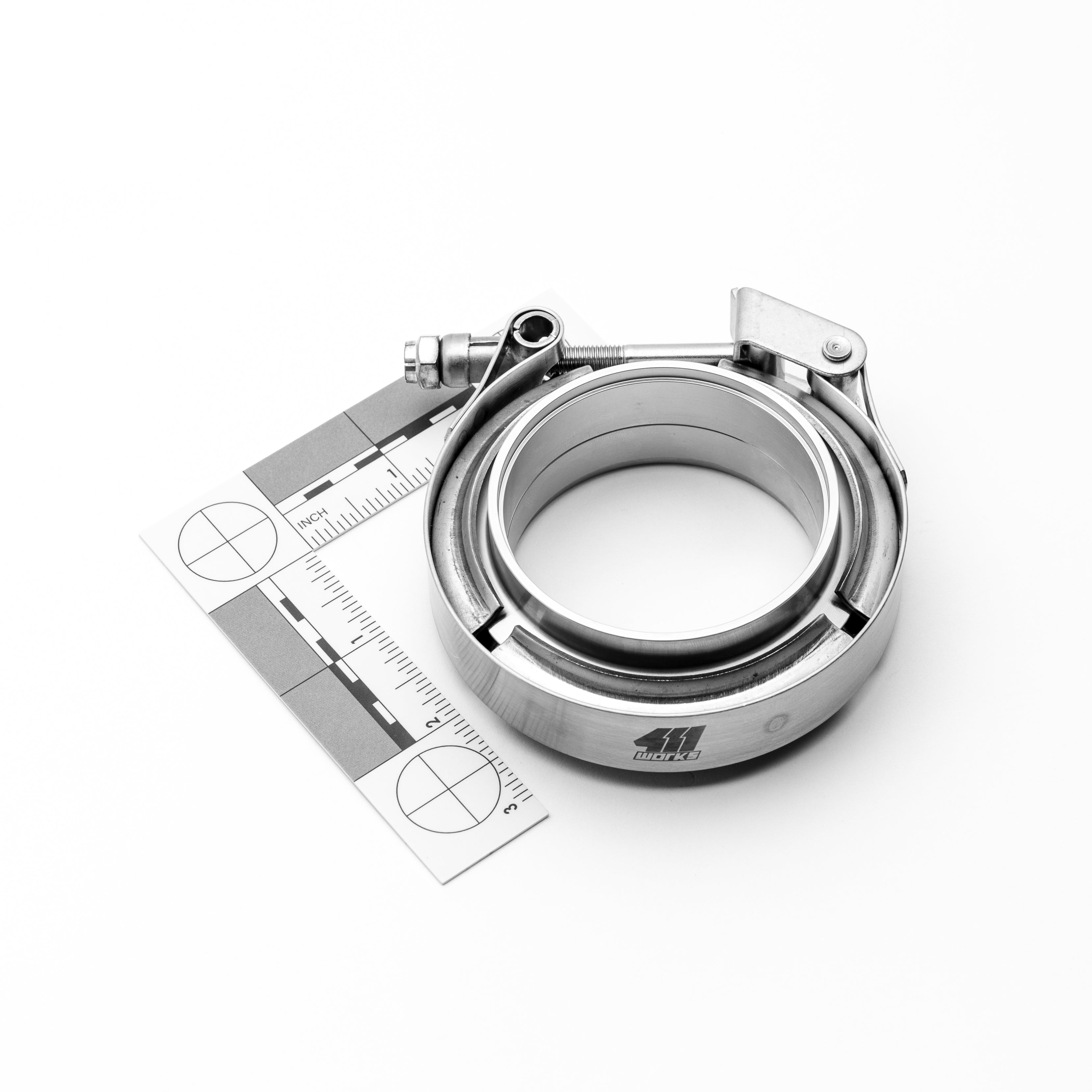 Metallic clamp with a ruler on a white background