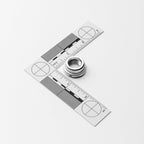 Metal weld bung on a white background with a square ruler