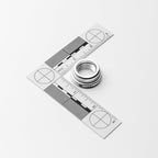 Metallic circle and ruler on a white background