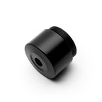 Black cylindrical object with threaded end on a white background