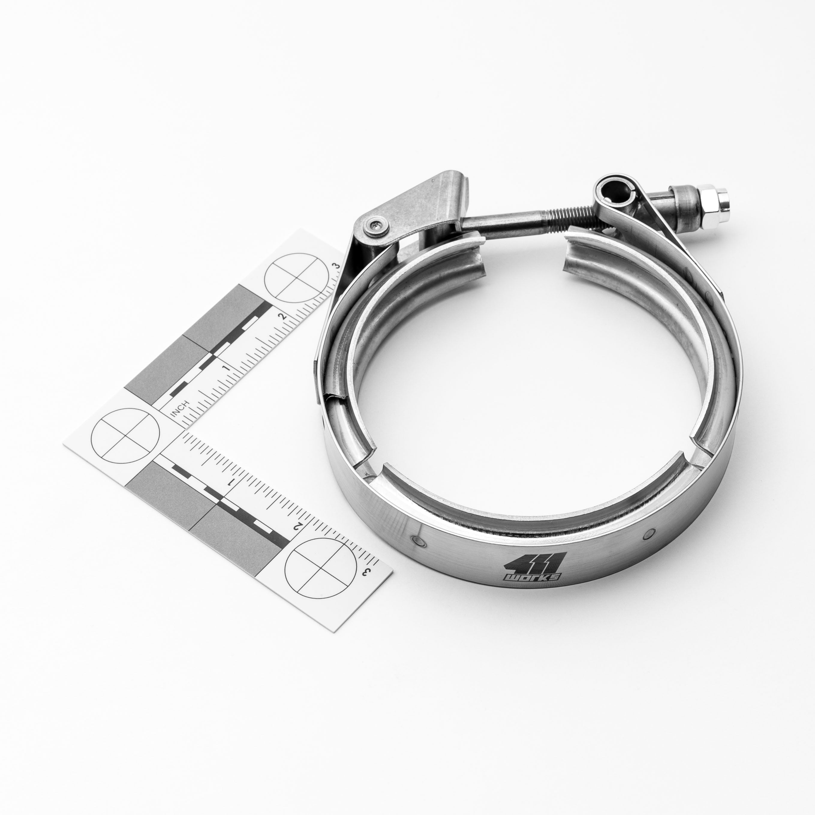 Metallic clamp with measurement tool on a white background